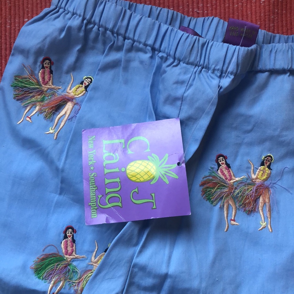 Girls cotton pants with embroidered hula dancers.